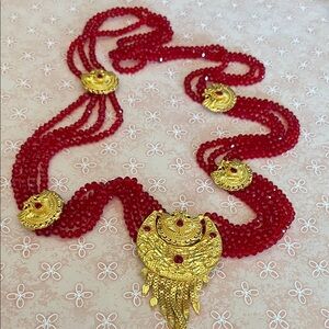 Beautiful Nepali 22K gold plate medallion necklace strung with red crystal beads